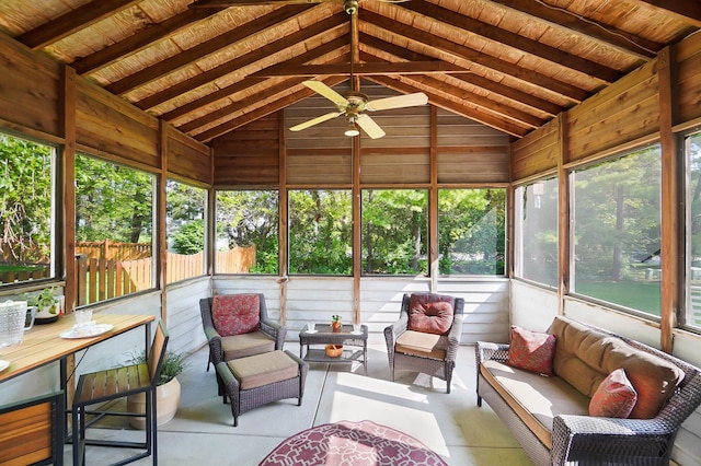 sunroom with outdoor lounge area, vaulted ceiling, ceiling fan, and plenty of natural light