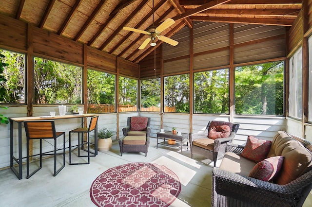 sunroom / solarium featuring an outdoor living space, lofted ceiling, and ceiling fan