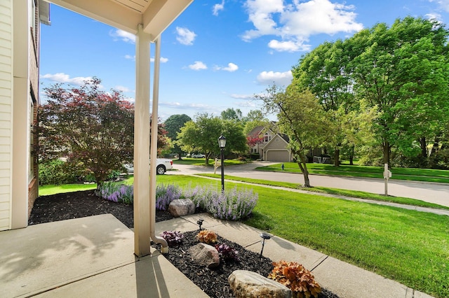 view of patio featuring a garage