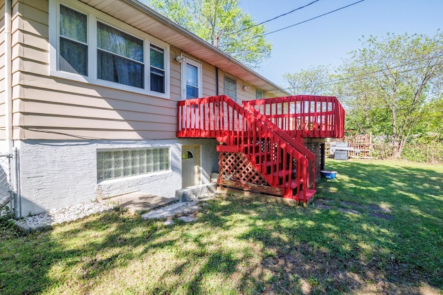 1469 Sandalwood Pl, Columbus, OH 43229 - wooden terrace with stairway and a lawn