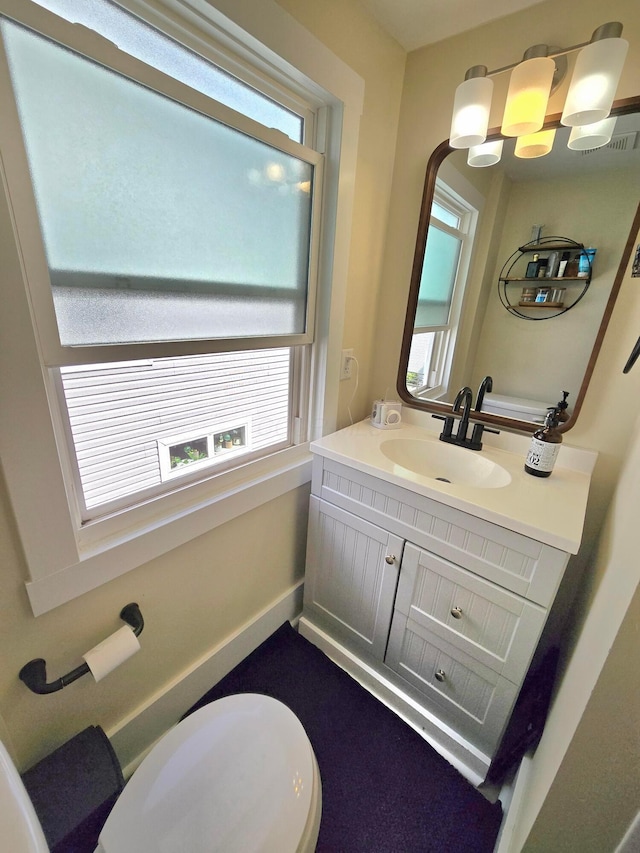 690 E Kossuth St, Columbus, OH 43206 - half bath with plenty of natural light, vanity, and baseboards
