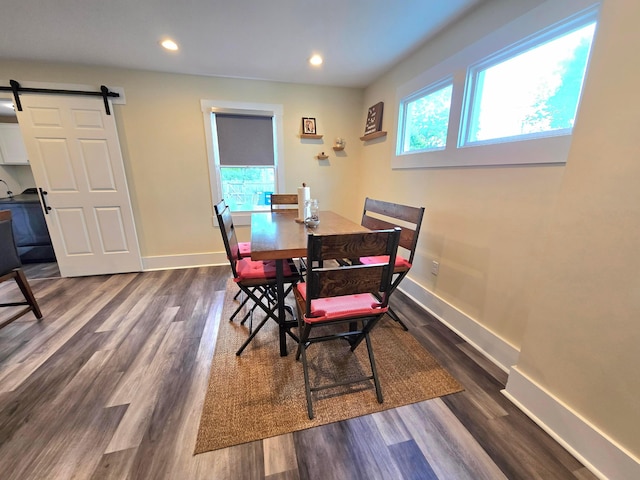 690 E Kossuth St, Columbus, OH 43206 - dining space with a barn door, baseboards, dark wood finished floors, and recessed lighting
