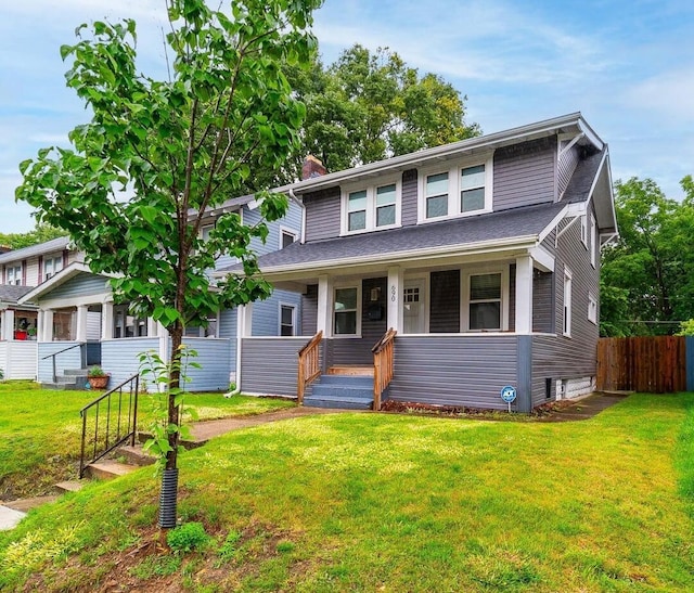 690 E Kossuth St, Columbus, OH 43206 - american foursquare style home with covered porch and a chimney