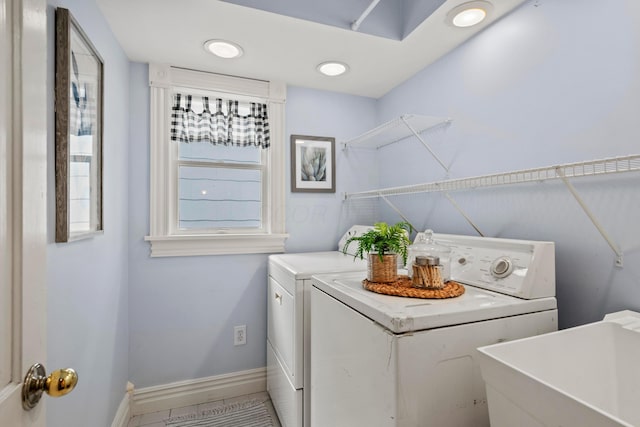 1042 Neil Ave, Columbus, OH 43201 - washroom featuring independent washer and dryer and baseboards