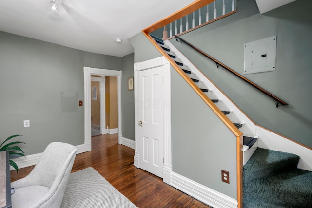 1042 Neil Ave, Columbus, OH 43201 - home office featuring electric panel, wood finished floors, and baseboards