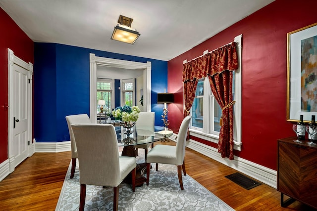 1042 Neil Ave, Columbus, OH 43201 - dining space with wood finished floors and baseboards