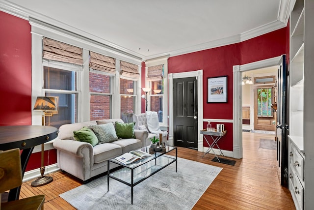 1042 Neil Ave, Columbus, OH 43201 - living room with crown molding, wood finished floors, and baseboards