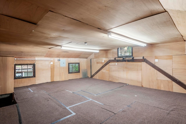 1042 Neil Ave, Columbus, OH 43201 - basement featuring wooden walls, wooden ceiling, and carpet floors