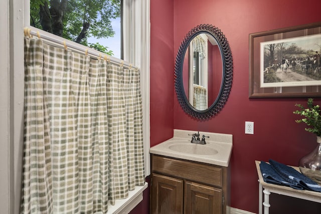 1042 Neil Ave, Columbus, OH 43201 - full bath featuring vanity and a shower with shower curtain