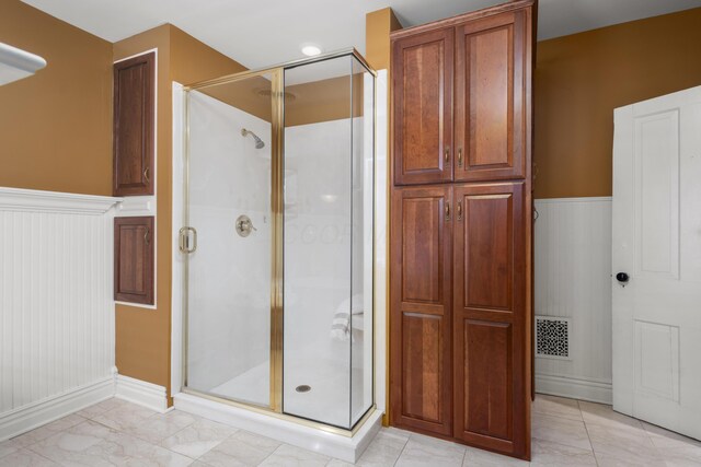 1042 Neil Ave, Columbus, OH 43201 - full bath with a wainscoted wall and a stall shower