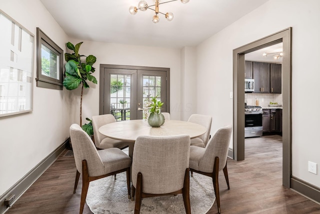 46 E Markison Ave, Columbus, OH 43207 - dining room featuring plenty of natural light, a chandelier, french doors, and wood finished floors