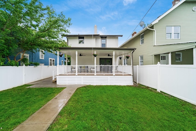 46 E Markison Ave, Columbus, OH 43207 - rear view of property with a ceiling fan and a chimney