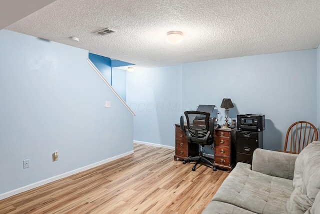 5120 Singleton Dr Unit 36D, Hilliard, OH 43026 - office space with wood finished floors, a textured ceiling, and baseboards