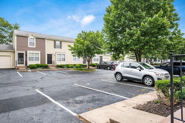 5120 Singleton Dr Unit 36D, Hilliard, OH 43026 - uncovered parking lot with entry steps