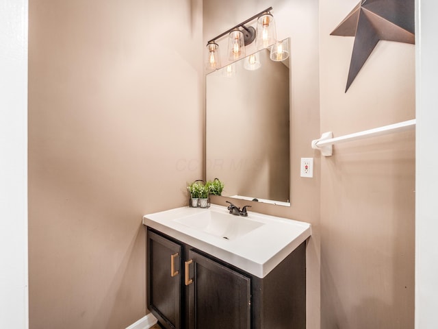 4710 Helmsbridge Ct, Grove City, OH 43123 - bathroom featuring vanity and baseboards