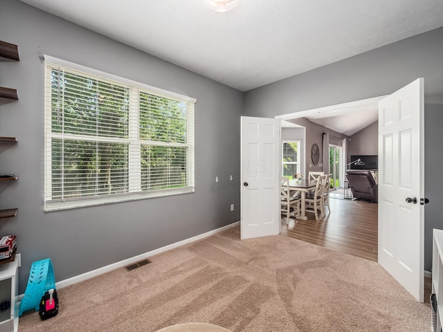 4710 Helmsbridge Ct, Grove City, OH 43123 - carpeted empty room with baseboards and vaulted ceiling