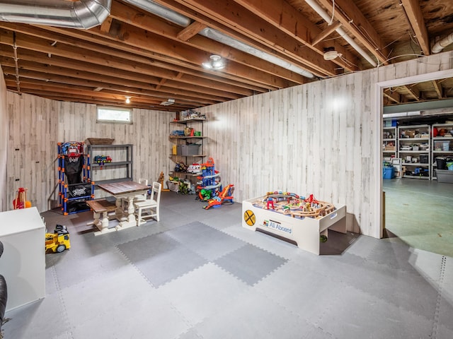 4710 Helmsbridge Ct, Grove City, OH 43123 - basement with wood walls and tile patterned floors