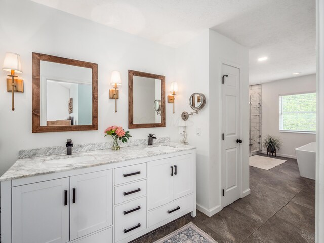 4710 Helmsbridge Ct, Grove City, OH 43123 - full bath with double vanity, a freestanding bath, baseboards, and recessed lighting