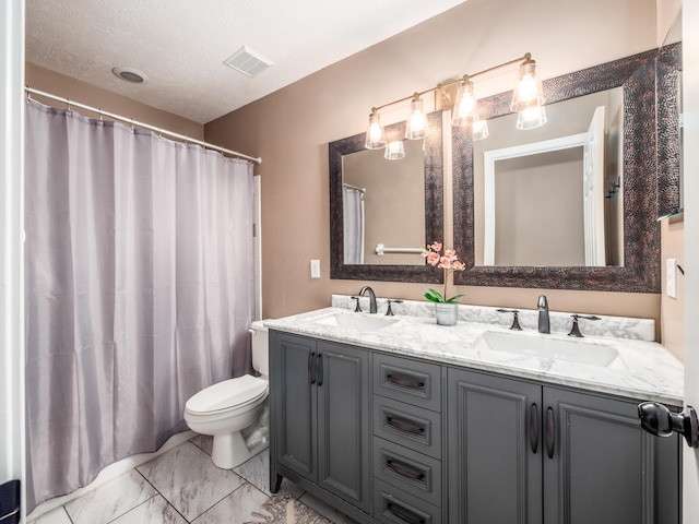 4710 Helmsbridge Ct, Grove City, OH 43123 - bathroom featuring double vanity, toilet, and marble finish flooring