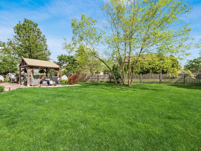 4710 Helmsbridge Ct, Grove City, OH 43123 - view of yard with outdoor lounge area, a gazebo, and a patio