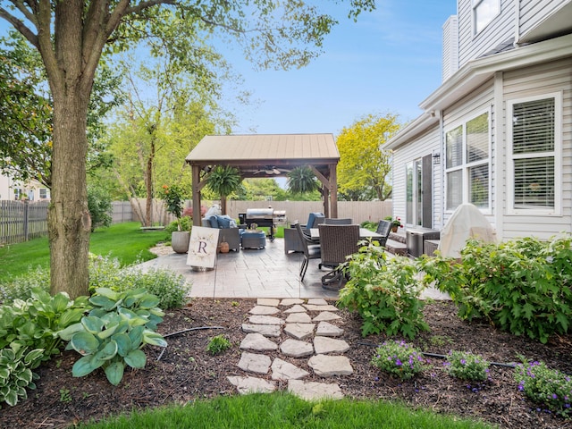 4710 Helmsbridge Ct, Grove City, OH 43123 - view of patio / terrace featuring outdoor lounge area, a gazebo, and a fenced backyard