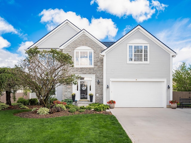 4710 Helmsbridge Ct, Grove City, OH 43123 - traditional home with stone siding, a garage, and concrete driveway
