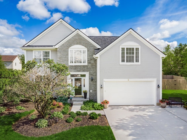 4710 Helmsbridge Ct, Grove City, OH 43123 - traditional-style home with stone siding, driveway, and a garage