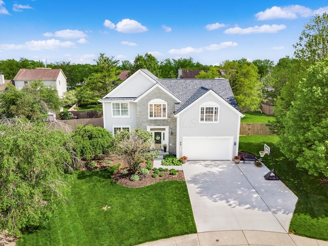 4710 Helmsbridge Ct, Grove City, OH 43123 - traditional home with a garage, driveway, and stone siding
