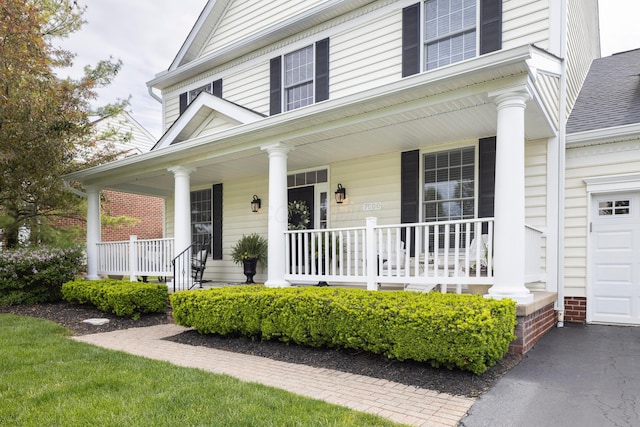 view of front of property featuring covered porch