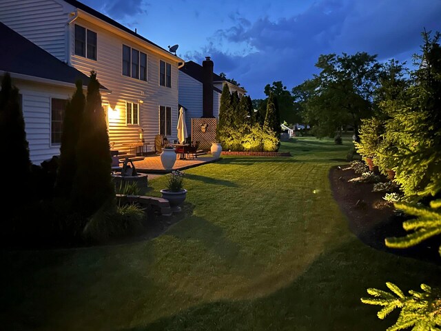 7000 Dean Farm Rd, New Albany, OH 43054 - view of green lawn featuring a patio area