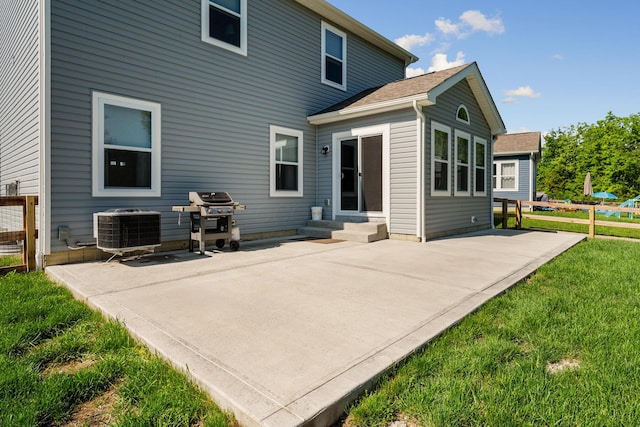 249 Rochdale, Delaware, OH 43015 - rear view of property with central AC unit and a patio area