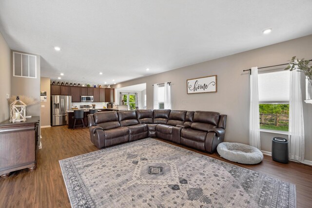 249 Rochdale, Delaware, OH 43015 - living area featuring healthy amount of natural light, dark wood finished floors, recessed lighting, and baseboards