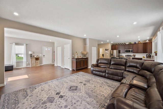 249 Rochdale, Delaware, OH 43015 - living area with dark wood-style flooring, recessed lighting, and baseboards