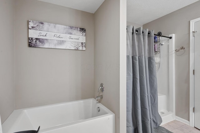 249 Rochdale, Delaware, OH 43015 - bathroom featuring a shower with curtain, a bathtub, and a textured ceiling