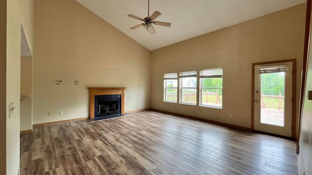 5332 Wadley Ct, Canal Winchester, OH 43110 - unfurnished living room with high vaulted ceiling, plenty of natural light, wood finished floors, ceiling fan, and a fireplace