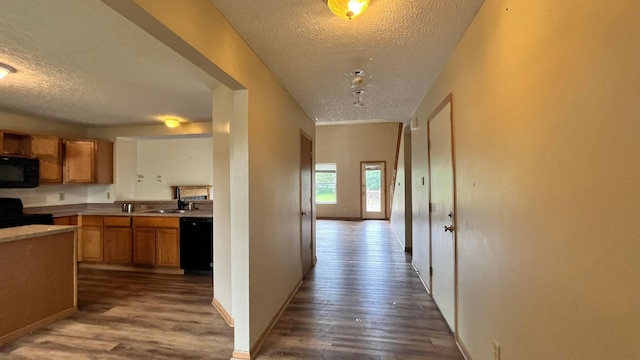 5332 Wadley Ct, Canal Winchester, OH 43110 - hall with a textured ceiling, dark wood-type flooring, baseboards, and a sink