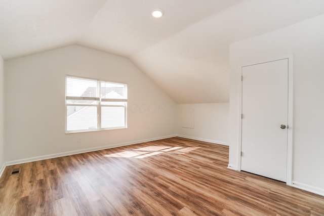 5332 Wadley Ct, Canal Winchester, OH 43110 - additional living space with wood finished floors and vaulted ceiling
