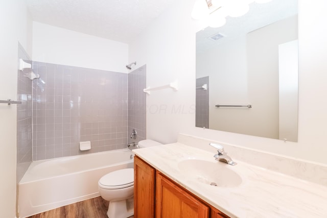 5332 Wadley Ct, Canal Winchester, OH 43110 - full bathroom featuring vanity, wood finished floors, and shower / washtub combination