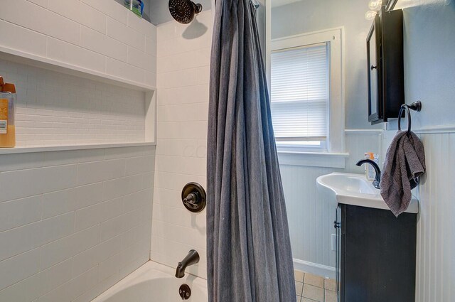 1306-1308 Wilson Ave, Columbus, OH 43206 - bathroom featuring vanity, shower / bath combination with curtain, a wainscoted wall, and tile patterned flooring