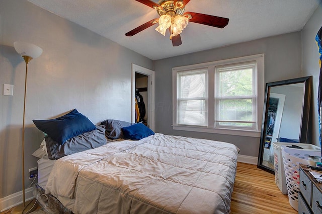 1306-1308 Wilson Ave, Columbus, OH 43206 - bedroom with light wood-type flooring, baseboards, and ceiling fan