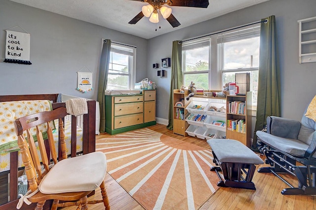 1306-1308 Wilson Ave, Columbus, OH 43206 - bedroom featuring light wood finished floors, baseboards, and ceiling fan