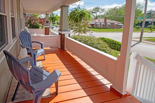 1306-1308 Wilson Ave, Columbus, OH 43206 - wooden deck featuring covered porch
