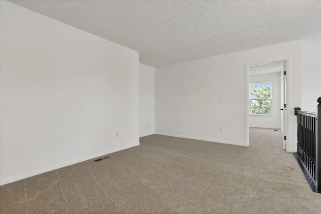 3907 Winding Path Dr, Canal Winchester, OH 43110 - carpeted spare room featuring a textured ceiling and baseboards