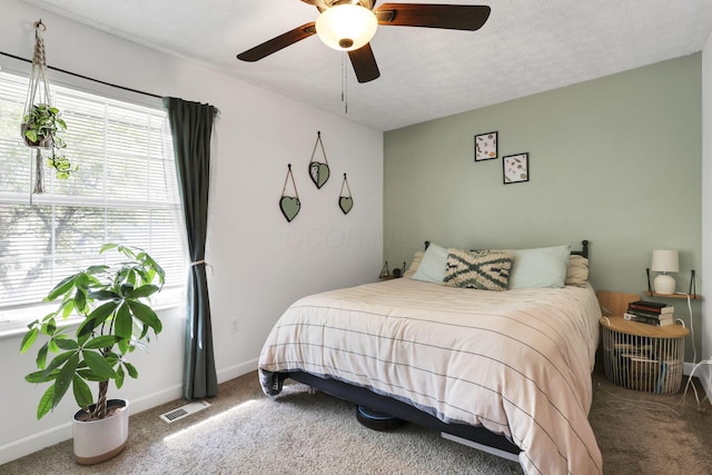 230 Clover Ct, Newark, OH 43055 - carpeted bedroom with a ceiling fan and baseboards