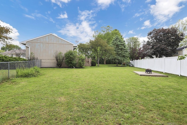 230 Clover Ct, Newark, OH 43055 - view of yard featuring an outdoor fire pit
