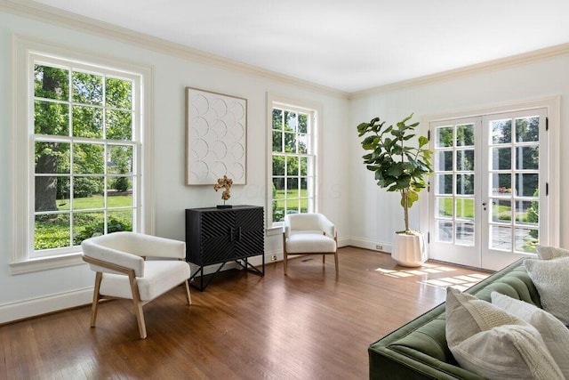 324 E N Broadway St, Columbus, OH 43214 - sitting room featuring baseboards, wood finished floors, crown molding, and french doors