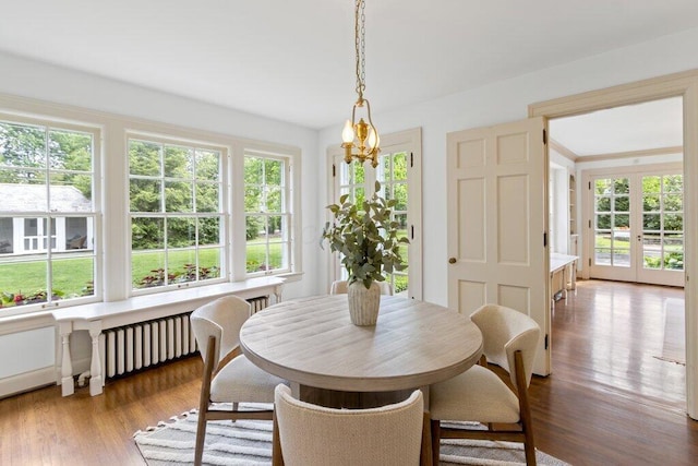 324 E N Broadway St, Columbus, OH 43214 - dining room featuring plenty of natural light, wood finished floors, and french doors
