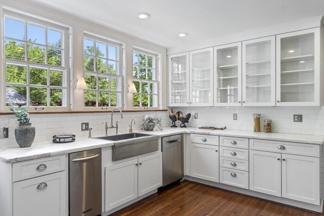 324 E N Broadway St, Columbus, OH 43214 - kitchen with a sink, stainless steel dishwasher, backsplash, plenty of natural light, and recessed lighting