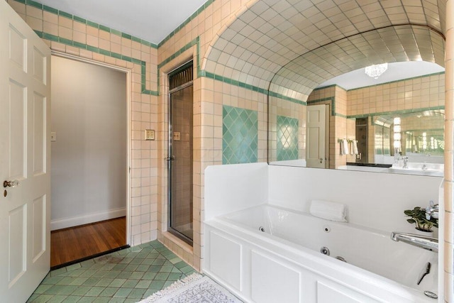 324 E N Broadway St, Columbus, OH 43214 - full bathroom with a whirlpool tub, a shower stall, and tile patterned floors