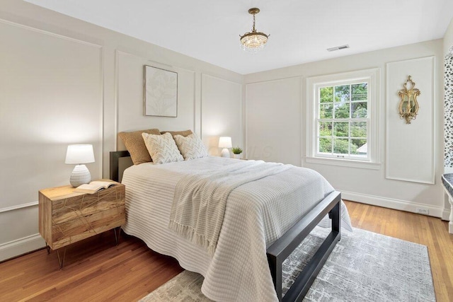 324 E N Broadway St, Columbus, OH 43214 - bedroom with wood finished floors and baseboards